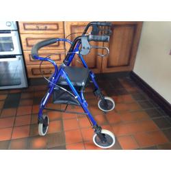 4 wheeled mobility walking aid with seat. Hardly used. Excellent condition