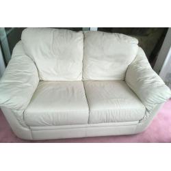 Cream two seater leather sofa