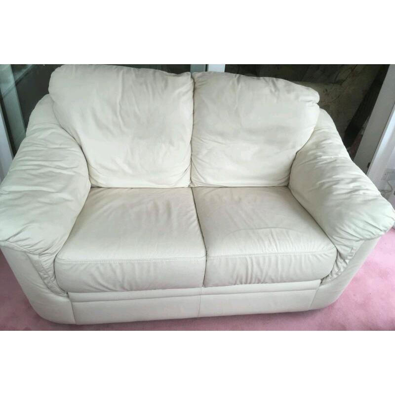 Cream two seater leather sofa