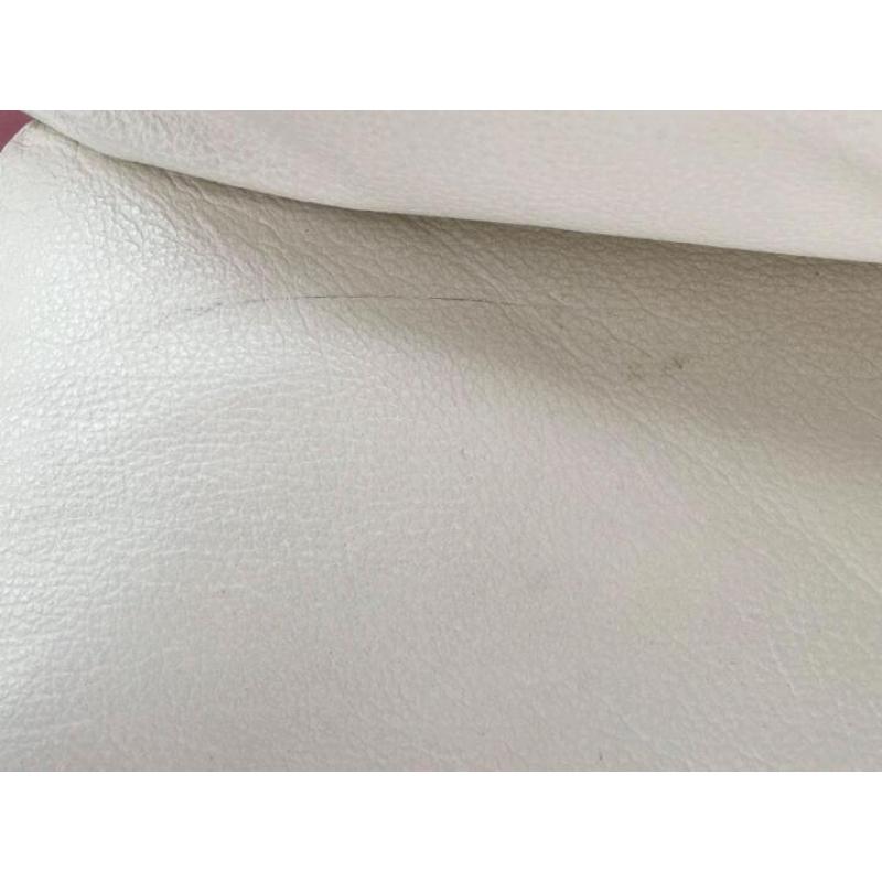 Cream two seater leather sofa