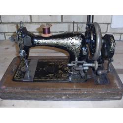 Hand cranked sewing machine.