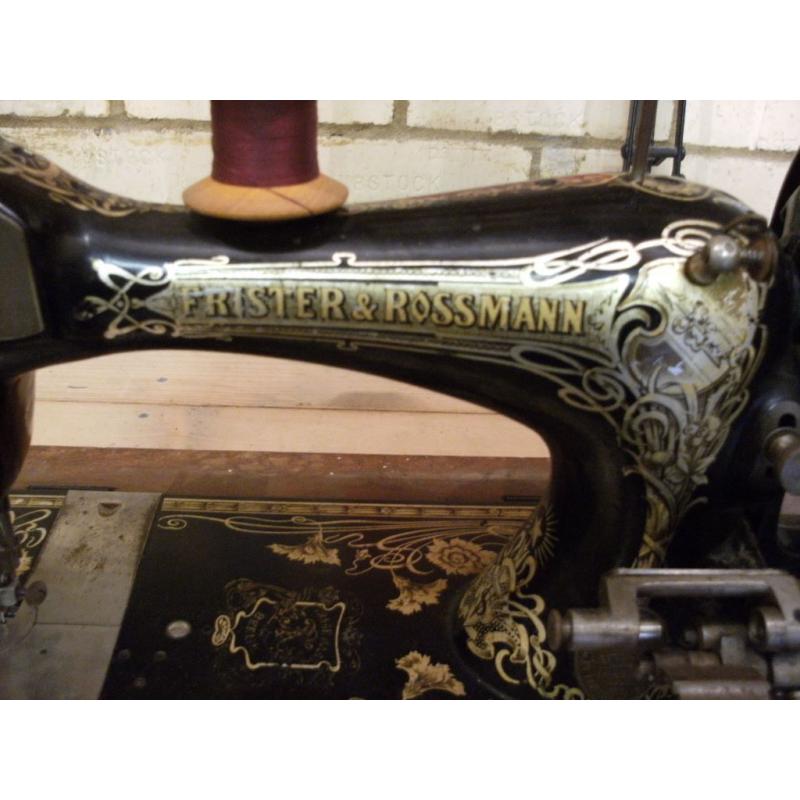 Hand cranked sewing machine.