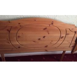 Wooden headboard for a double bed