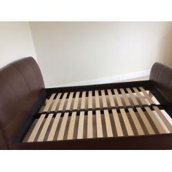 Double Leather M&S 'Sleigh Bed' in brown leather. Easy assembled.