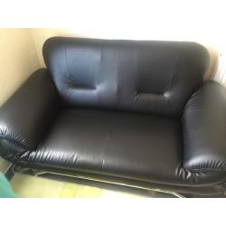 2 seater and 3 seaters black lather sofa for sale very good condition 79.99 ono