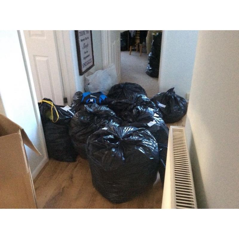 Huge black bags of boys clothes