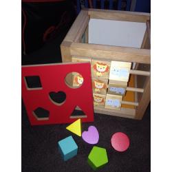 Wooden activity cube and shape puzzle