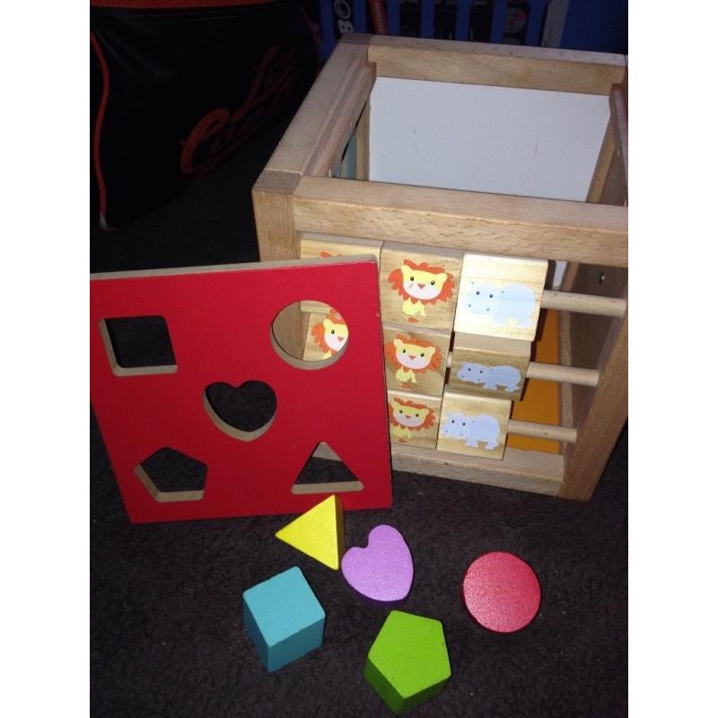 Wooden activity cube and shape puzzle