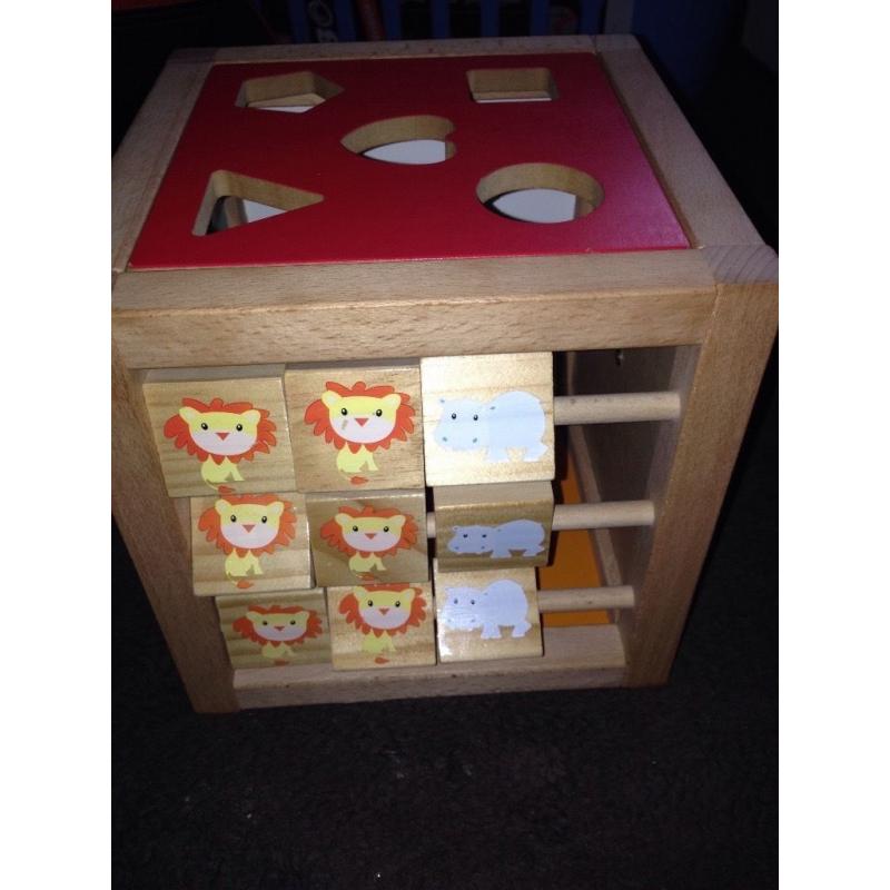 Wooden activity cube and shape puzzle