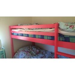 Hot pink wooden bunk beds