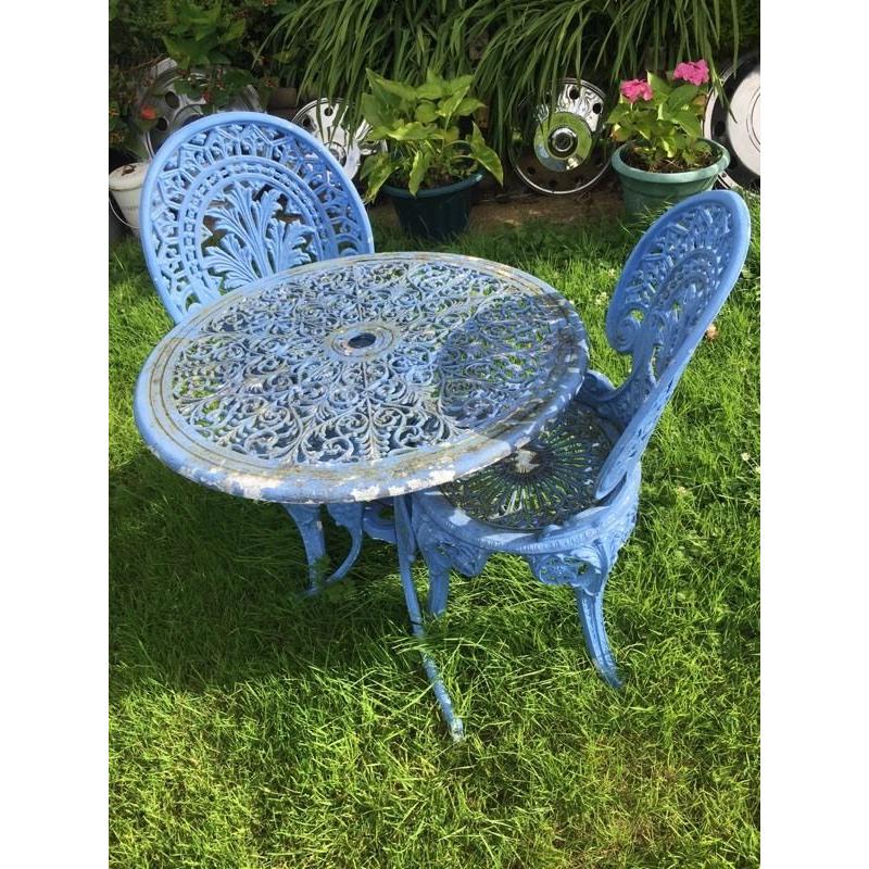 Blue cast ally table and chairs