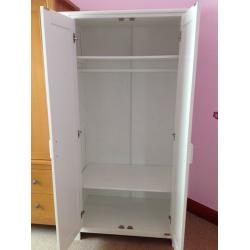 White furniture. Wardrobe and chest of drawers