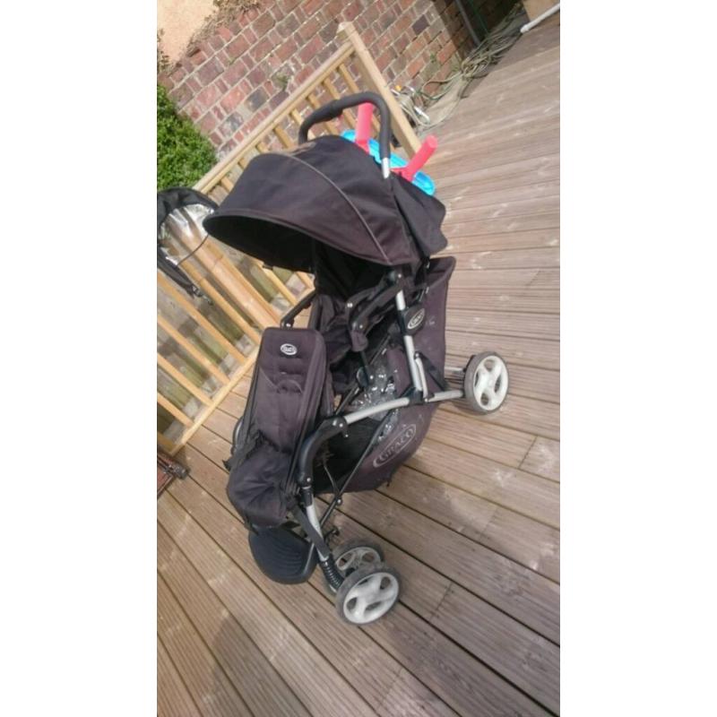 Graco double pram with raincovers