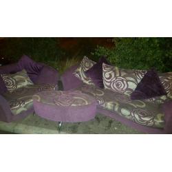 Purple sofas plus footstool