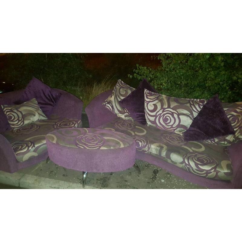 Purple sofas plus footstool